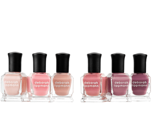 A group of bottles of nail polish

Description automatically generated